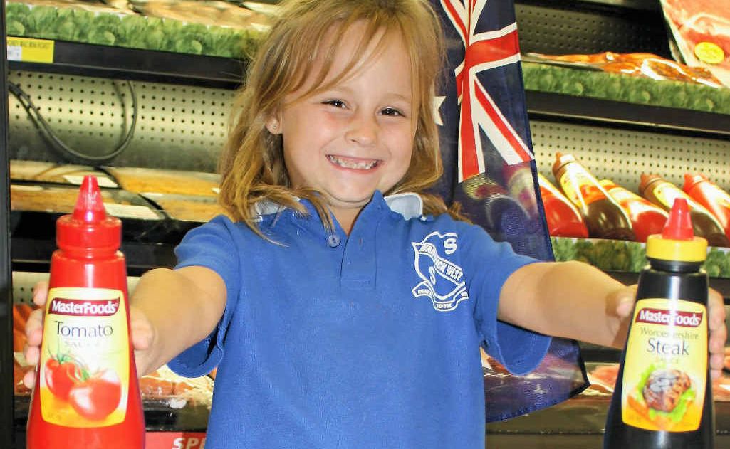 Haylee Beckhouse with the Australia Day essentials ahead of Thursday’s celebrations. Haylee Beckhouse with the Australia Day essentials ahead of Thursday’s celebrations.